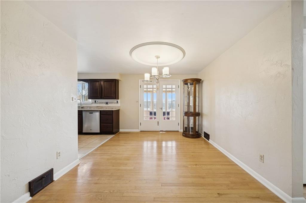 421 Robbins Station Road Irwin, PA 15642 - Photo 7 of 33 a view of a kitchen with a sink and cabinets