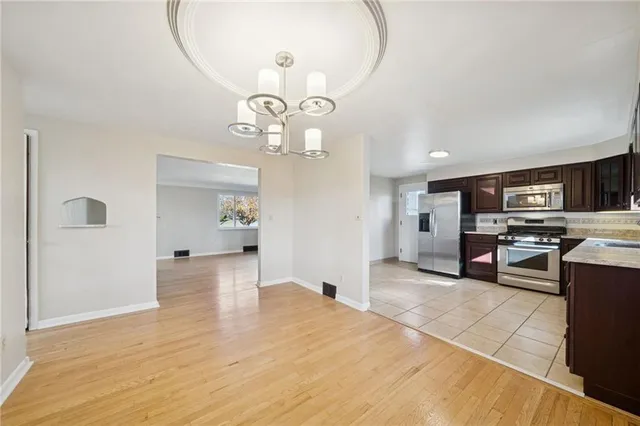 a view of a kitchen with sink and dishwasher kitchen view
