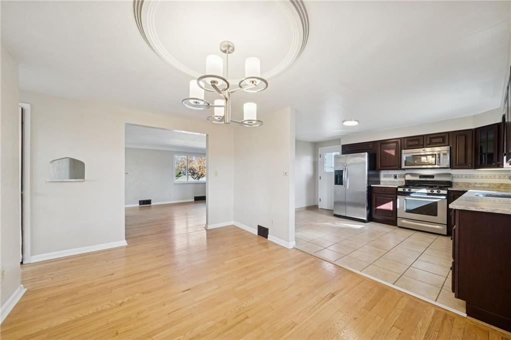 421 Robbins Station Road Irwin, PA 15642 - Photo 8 of 33 a view of a kitchen with sink and dishwasher kitchen view