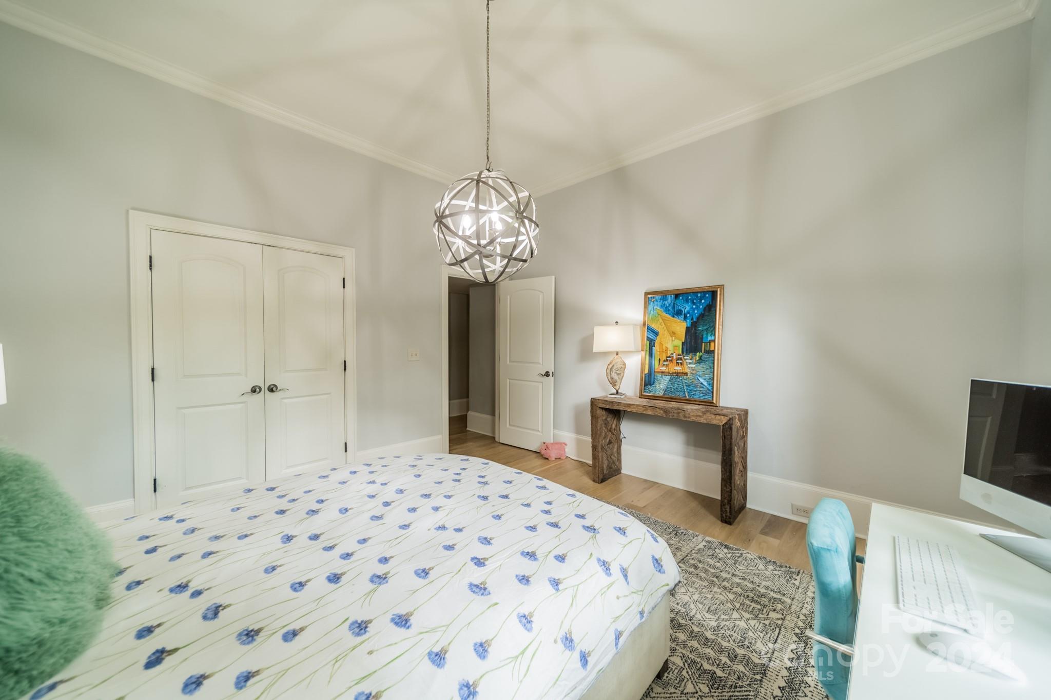 3701 Barclay Downs Drive Charlotte, NC 28209 - Photo 27 of 47 a bedroom with a bed and a television