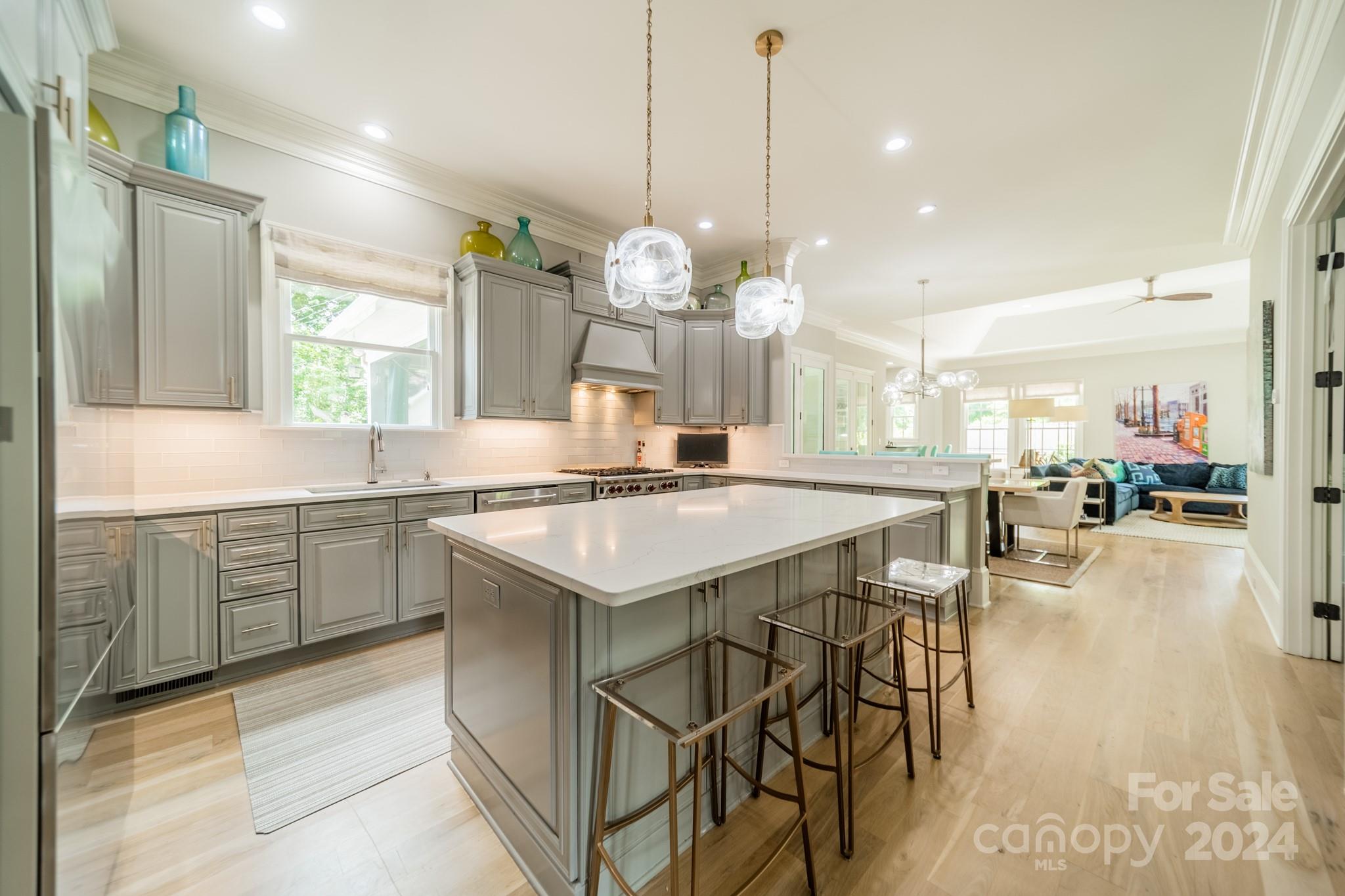 3701 Barclay Downs Drive Charlotte, NC 28209 - Photo 9 of 47 a kitchen with a table and chairs in it