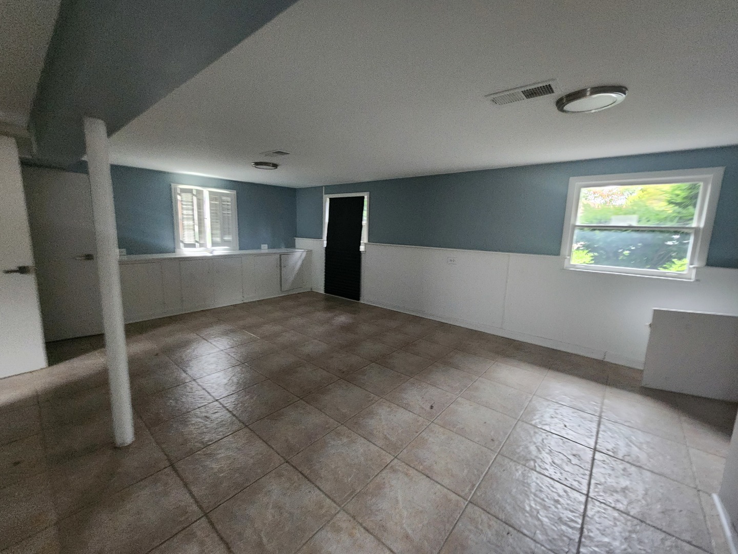 1208 Evergreen Road Homewood, IL 60430 - Photo 9 of 12 a view of empty room with window and fireplace