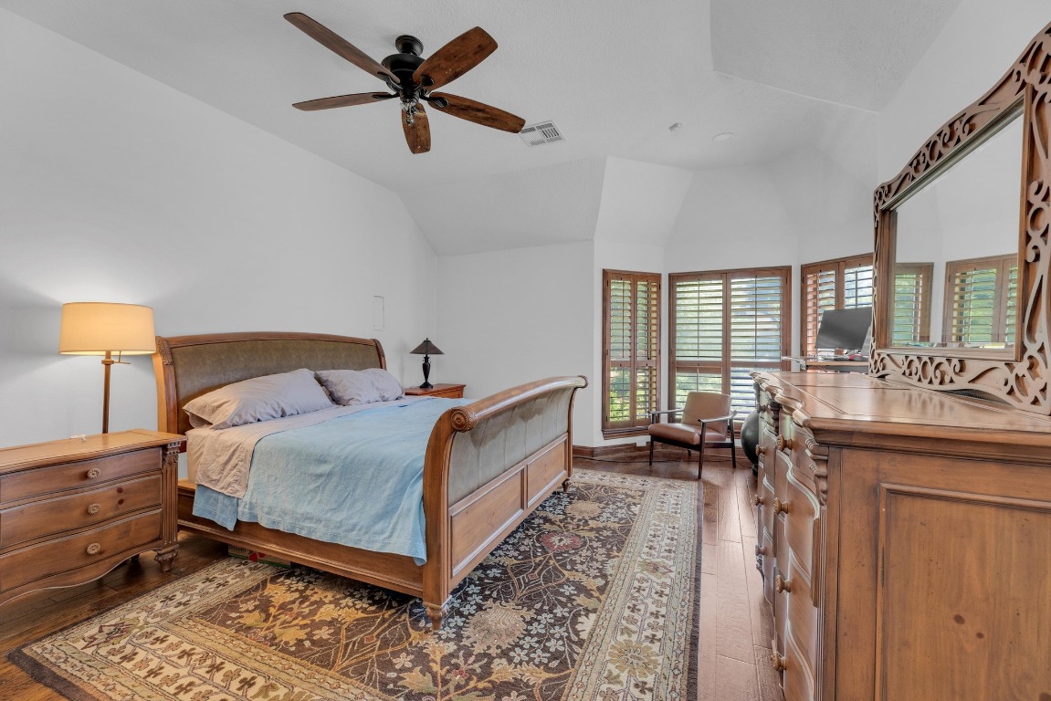 2 Meandering Way Round Rock, TX 78664 - Photo 20 of 39 a room with a bed and a table in it