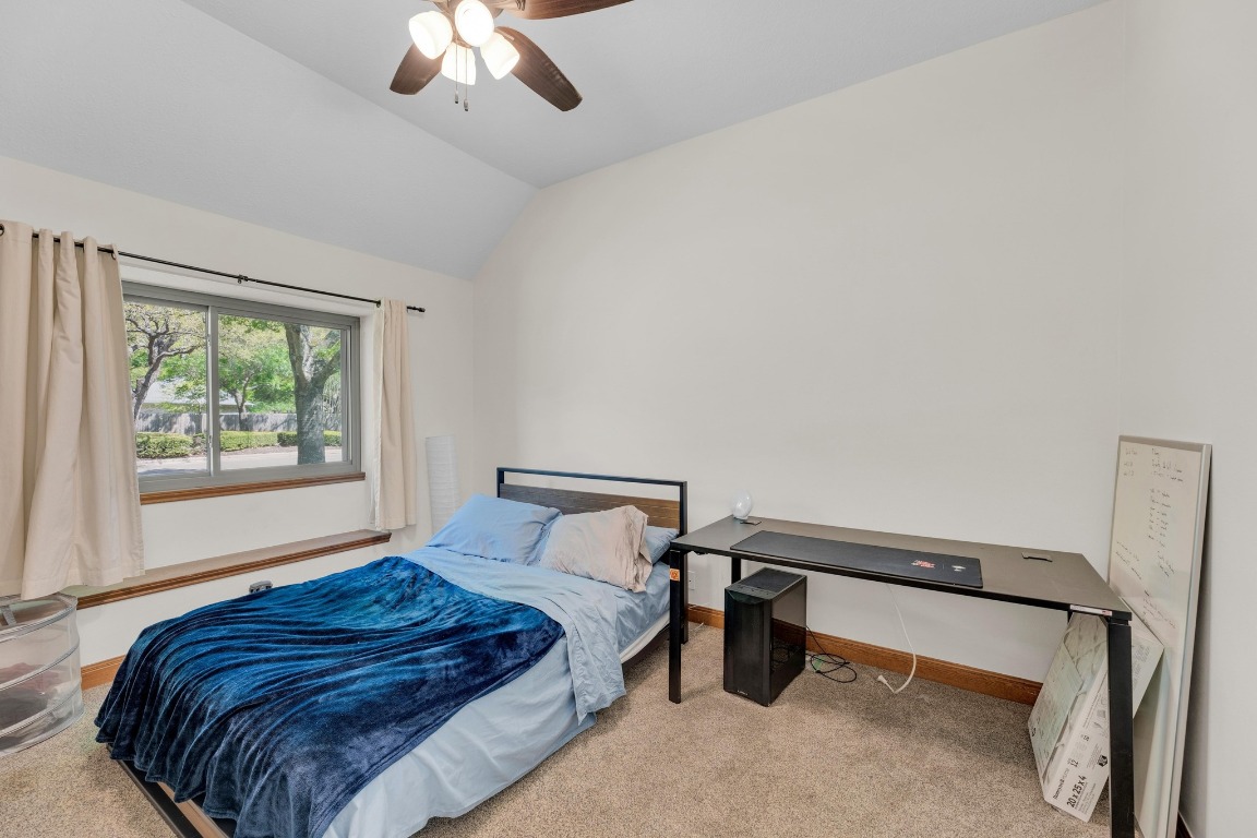 2 Meandering Way Round Rock, TX 78664 - Photo 27 of 39 a bedroom with a bed and a window