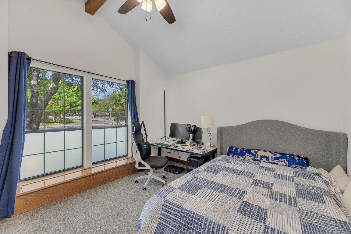 2 Meandering Way Round Rock, TX 78664 - Photo 29 of 39 a bedroom with a bed and large windows