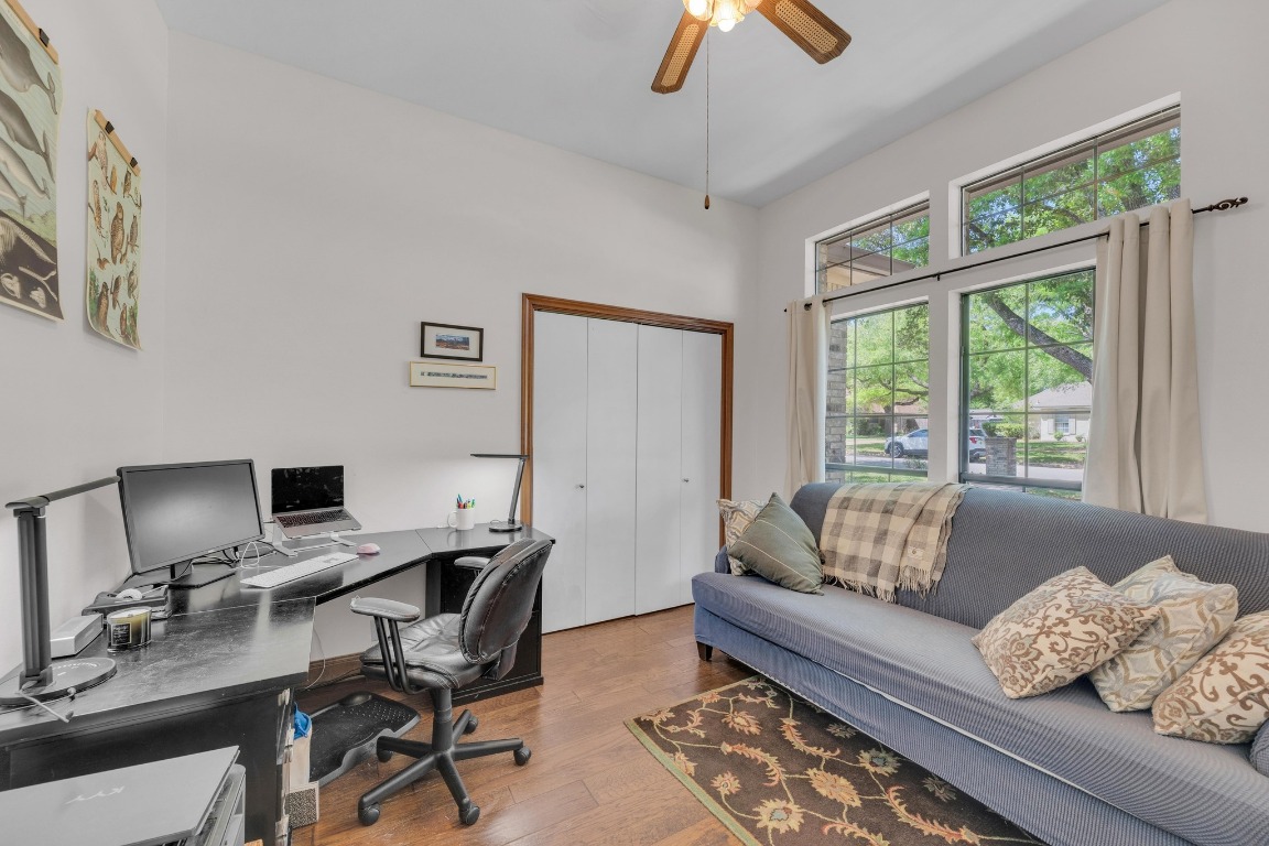 2 Meandering Way Round Rock, TX 78664 - Photo 30 of 39 a living room with furniture and a window