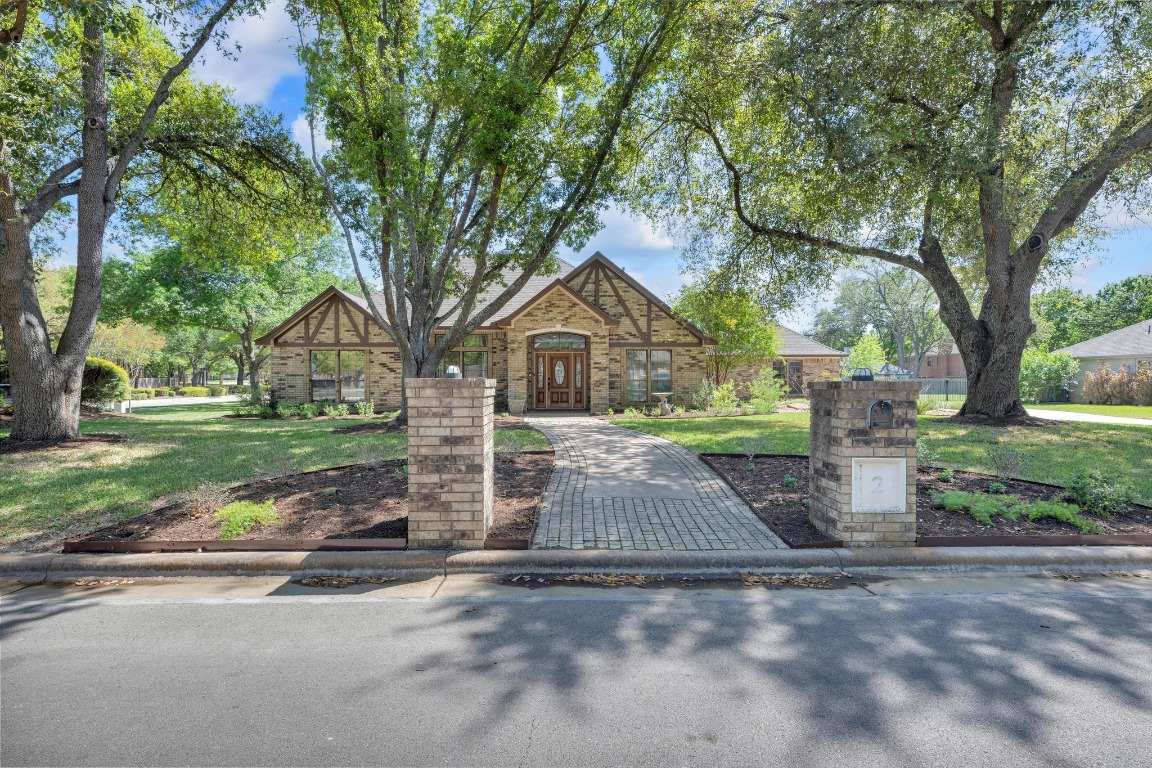 2 Meandering Way Round Rock, TX 78664 - Photo 3 of 39 a front view of house with yard and green space