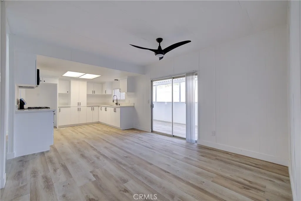 3700 Buchanan Street, Unit 164 Riverside, CA 92503 - Photo 18 of 40 a view of a kitchen with wooden floor and a window