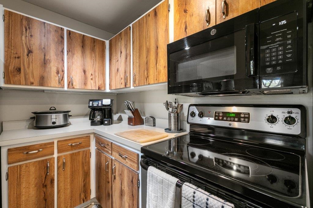 2 Cartagena Court St. Augustine, FL 32086 - Photo 19 of 49 a kitchen with a stove and a microwave