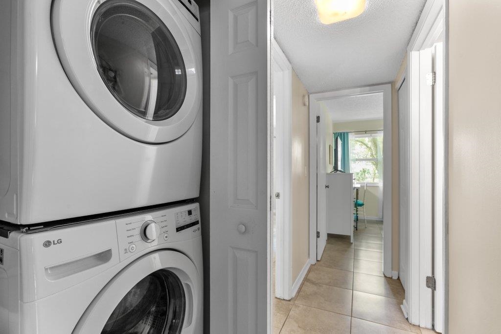 2 Cartagena Court St. Augustine, FL 32086 - Photo 22 of 49 a view of a hallway with washer and dryer