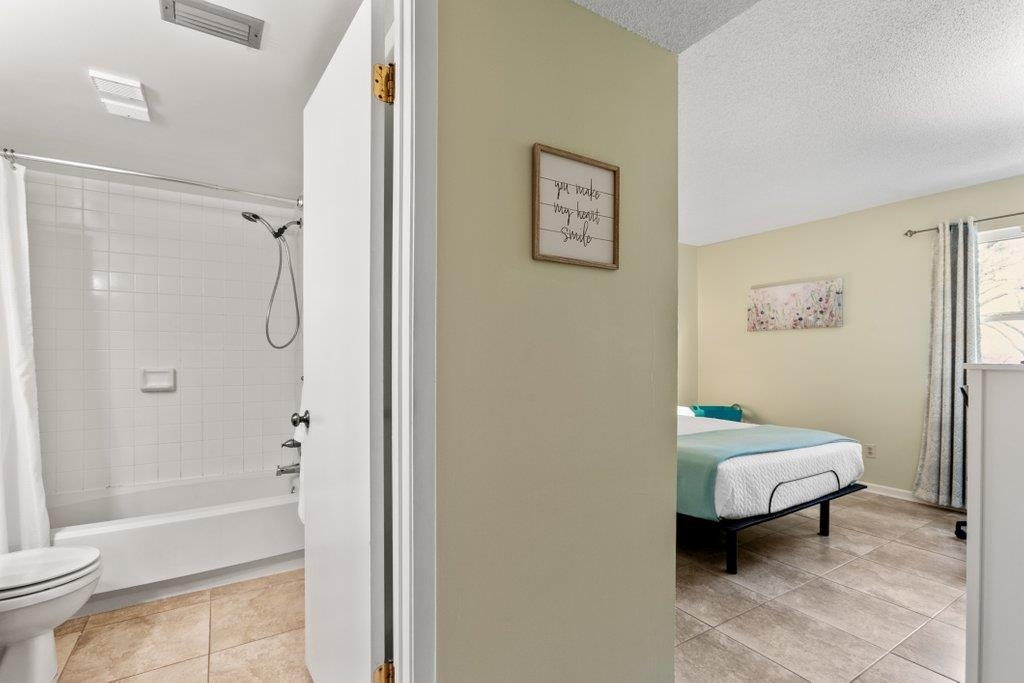 2 Cartagena Court St. Augustine, FL 32086 - Photo 23 of 49 a bathroom with a toilet and a shower