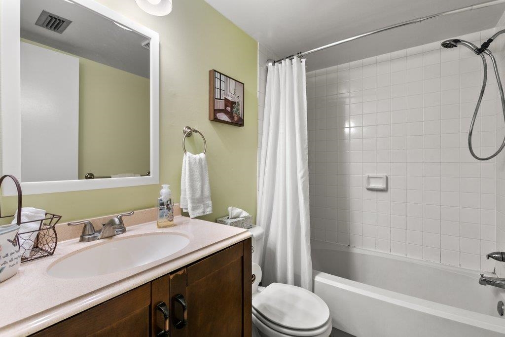 2 Cartagena Court St. Augustine, FL 32086 - Photo 24 of 49 a bathroom with a sink a toilet and shower