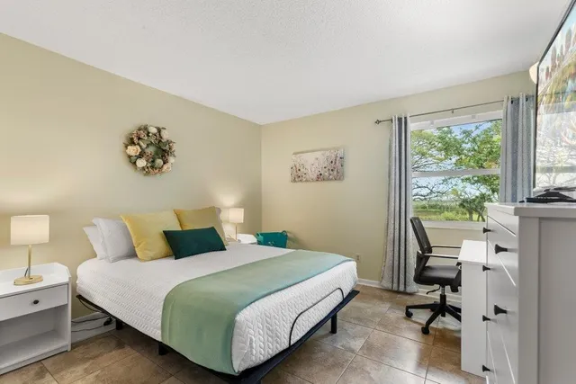 a view of a room with a large window