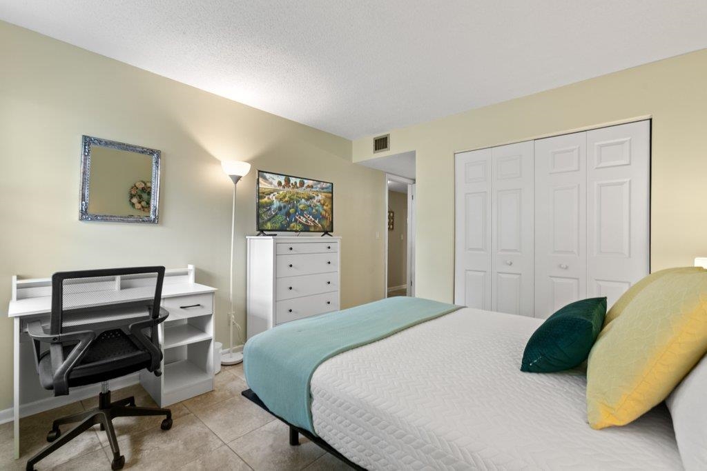 2 Cartagena Court St. Augustine, FL 32086 - Photo 28 of 49 a bedroom with a bed and a desk