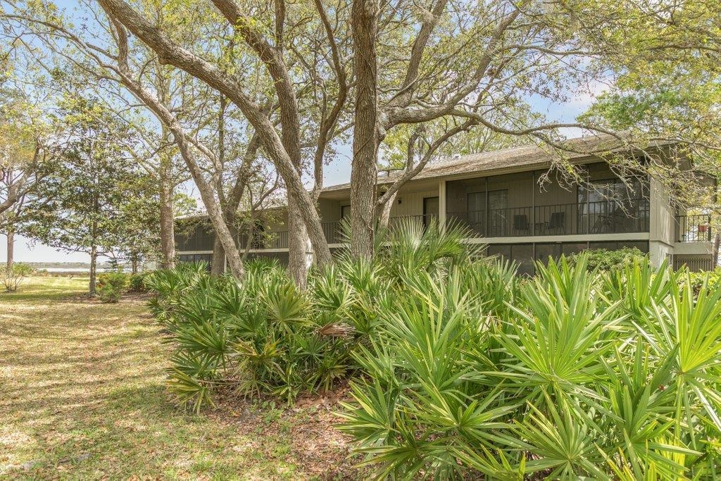 2 Cartagena Court St. Augustine, FL 32086 - Photo 35 of 49 a front view of a house with a yard