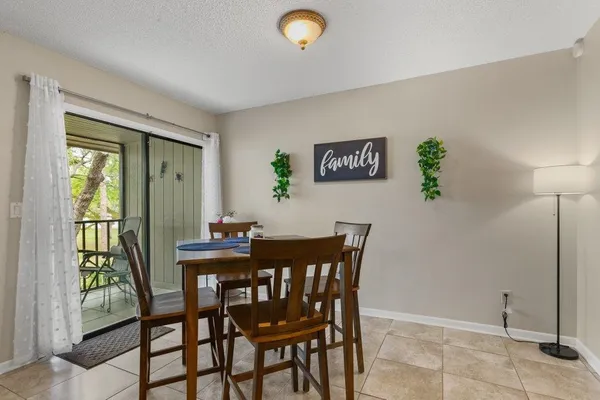 a view of a dining room with furniture