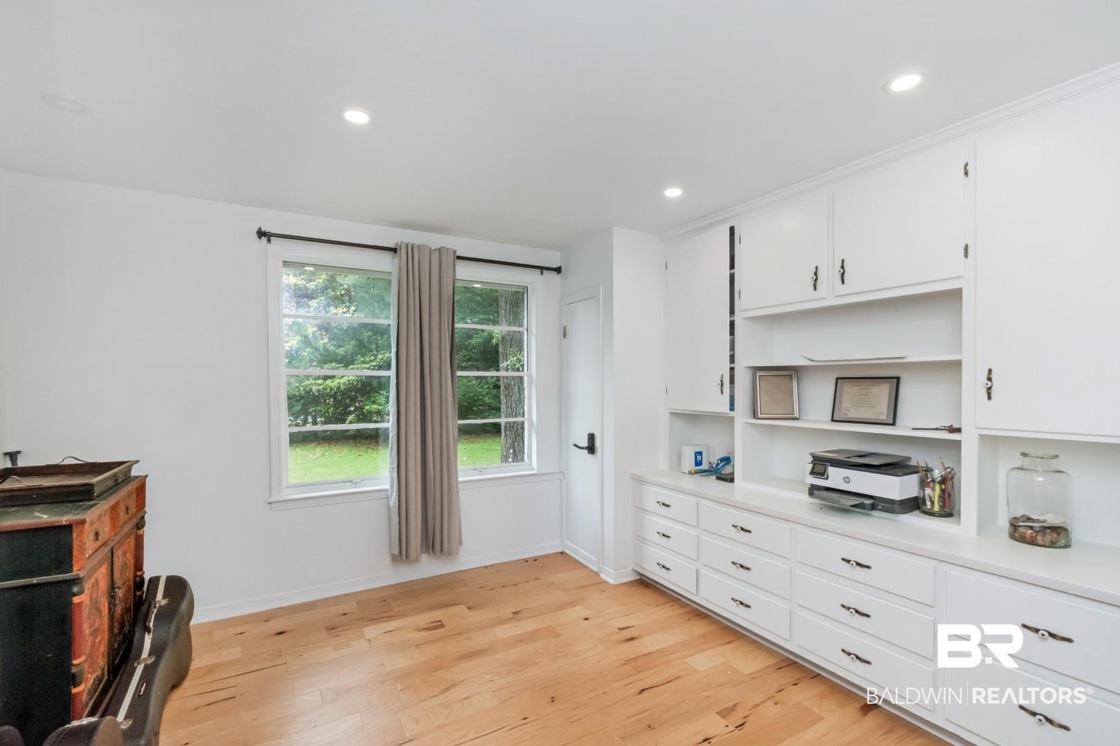 4596 Hawthorne Place Mobile, AL 36608 - Photo 10 of 34 Built-in white cabinetry and shelving with ample storage