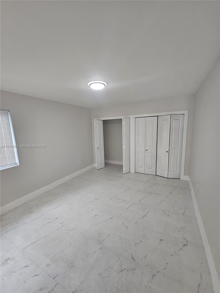 1361 Northwest 29th Terrace Miami, FL 33142 - Photo 5 of 7 a view of an empty room