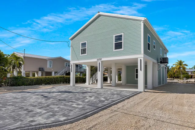 a view of a hallway view with staircase