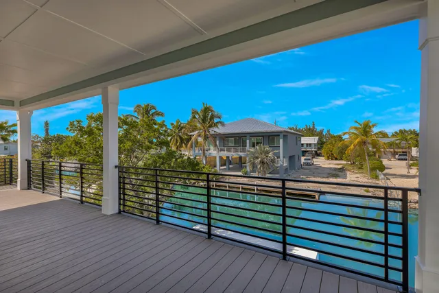 a view of kitchen with furniture and wooden floor