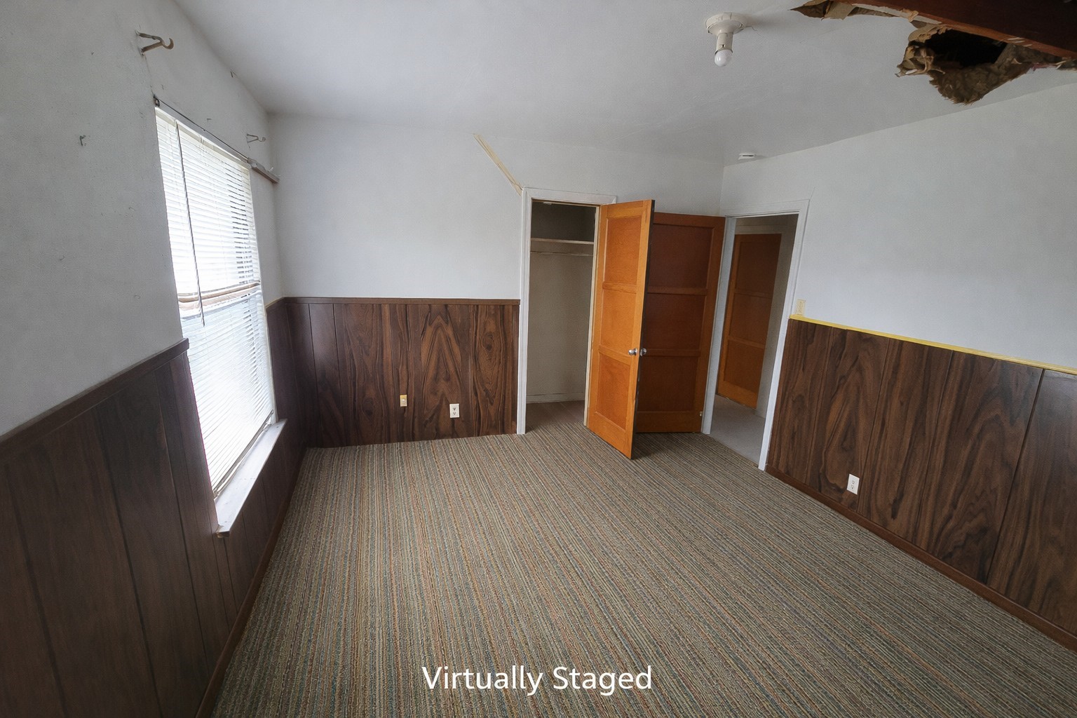 7822 Kimble Street Houston, TX 77017 - Photo 7 of 11 wooden floor in an empty room with a window