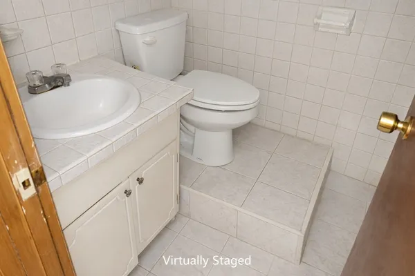 a bathroom with a sink and a toilet