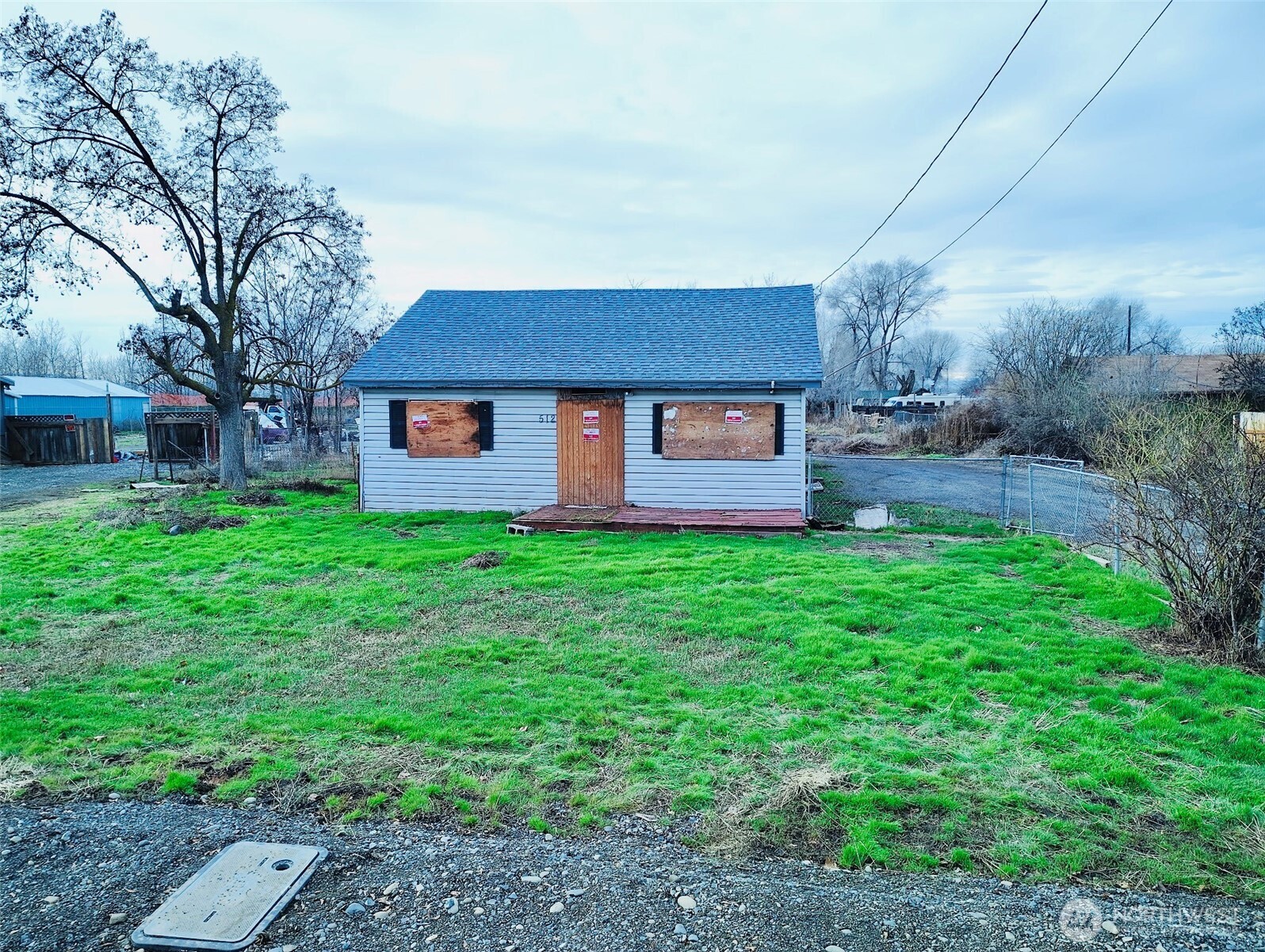 a view of a house with a back yard