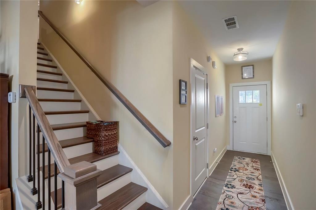 76 Garrison Drive Winder, GA 30680 - Photo 3 of 26 a view of an entryway with wooden floor