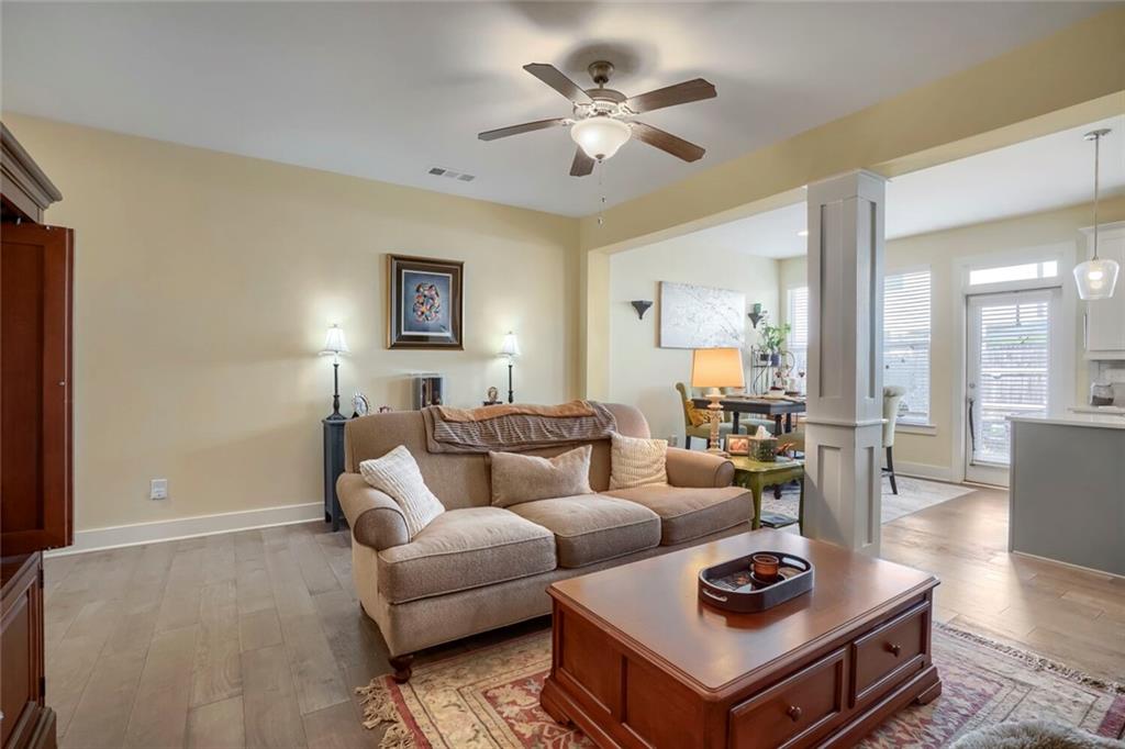 76 Garrison Drive Winder, GA 30680 - Photo 6 of 26 a living room with furniture a rug and a window