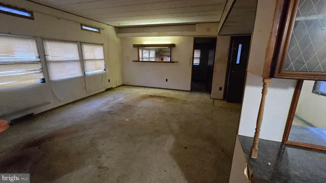 a view of empty room with front door