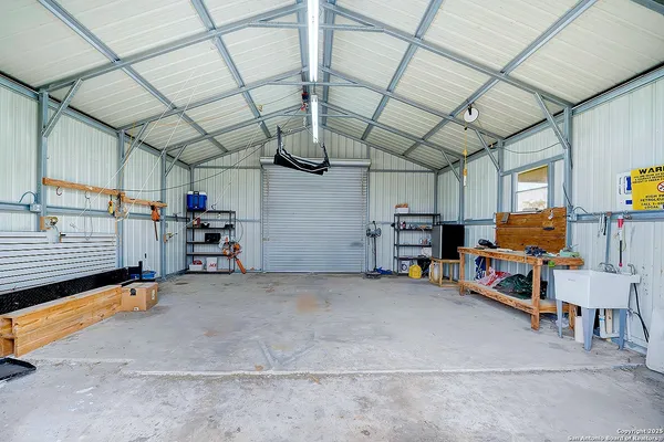 a view of swimming pool with a yard