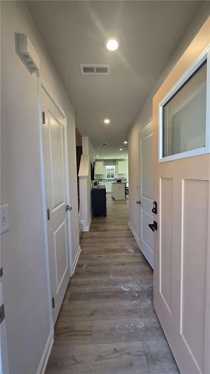 12 Downing Drive Adairsville, GA 30103 - Photo 11 of 36 a view of a hallway with wooden floor and staircase