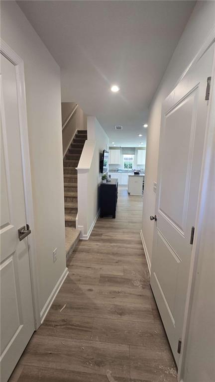 12 Downing Drive Adairsville, GA 30103 - Photo 15 of 36 a view of a hallway with wooden floor and staircase