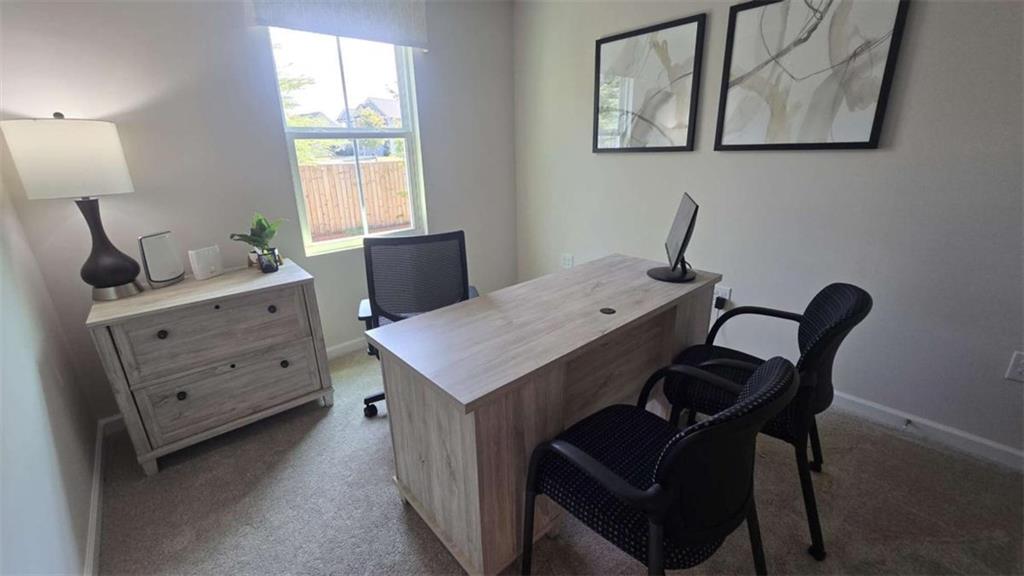 12 Downing Drive Adairsville, GA 30103 - Photo 16 of 36 a view of a workspace with furniture and window