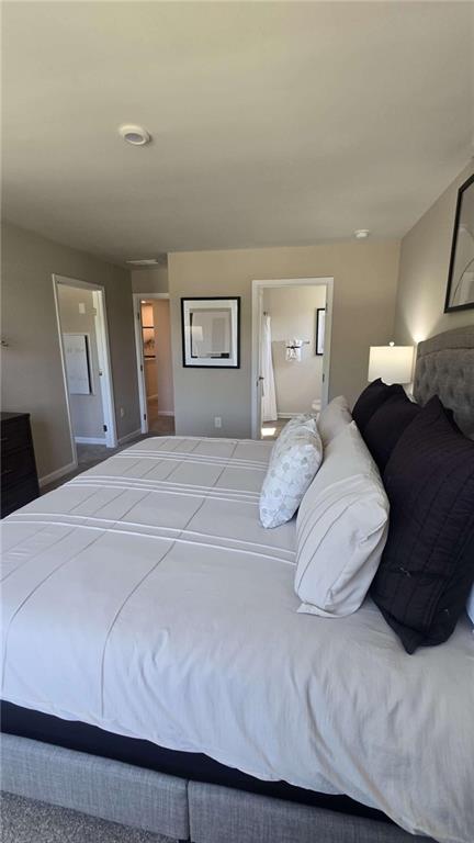 12 Downing Drive Adairsville, GA 30103 - Photo 24 of 36 a bedroom with a bed and window