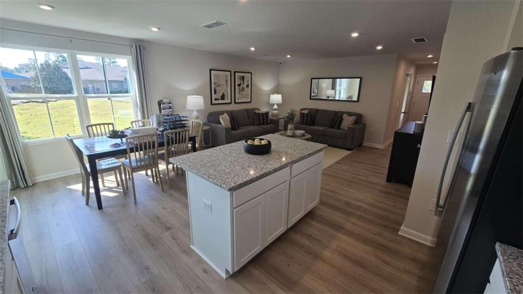 12 Downing Drive Adairsville, GA 30103 - Photo 27 of 36 a living room with furniture and a wooden floor
