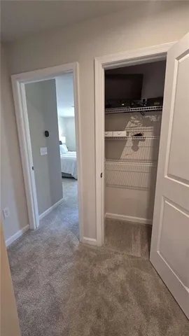 a bathroom with a sink toilet a shower and a mirror