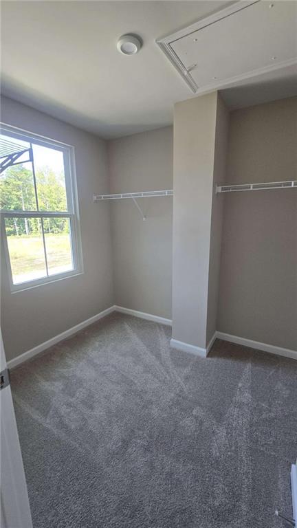 12 Downing Drive Adairsville, GA 30103 - Photo 9 of 36 an empty room with a window