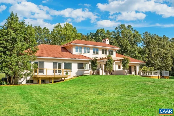 a view of a swimming pool with a patio