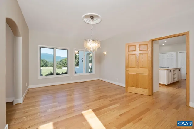 a view of a room that has a large window