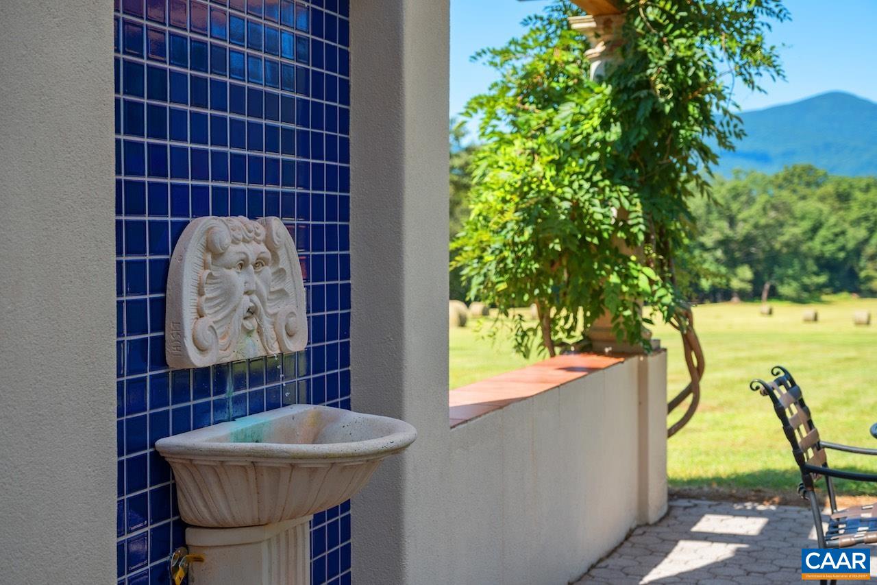 8540 Taylor Creek Road Afton, VA 22920 - Photo 34 of 71 a bathroom with a sink a toilet and a shower