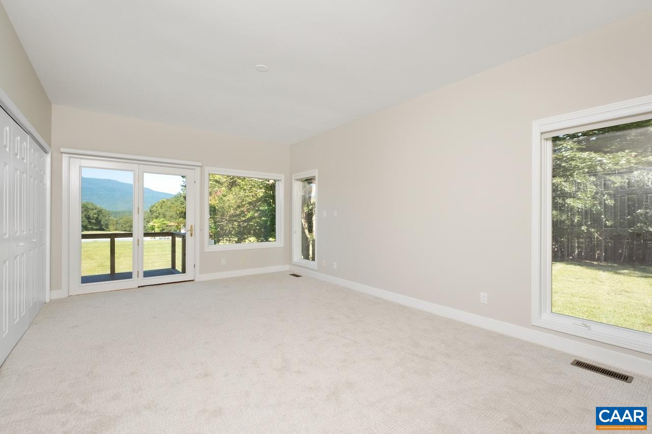 8540 Taylor Creek Road Afton, VA 22920 - Photo 39 of 71 an empty room with large windows