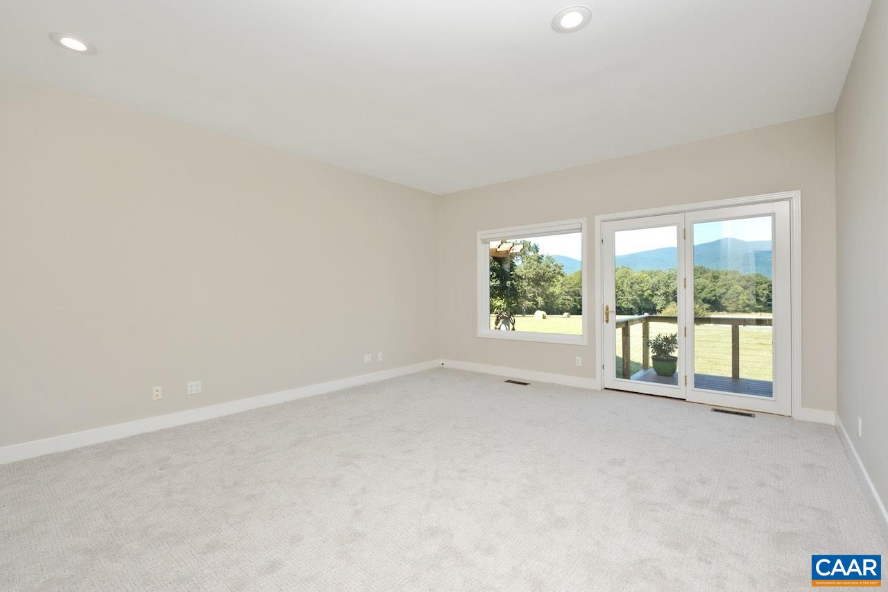 8540 Taylor Creek Road Afton, VA 22920 - Photo 42 of 71 an empty room with windows