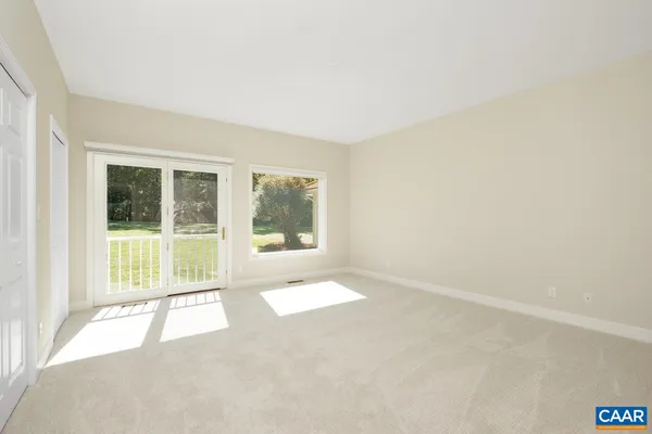 a view of a lake with mountains in the background