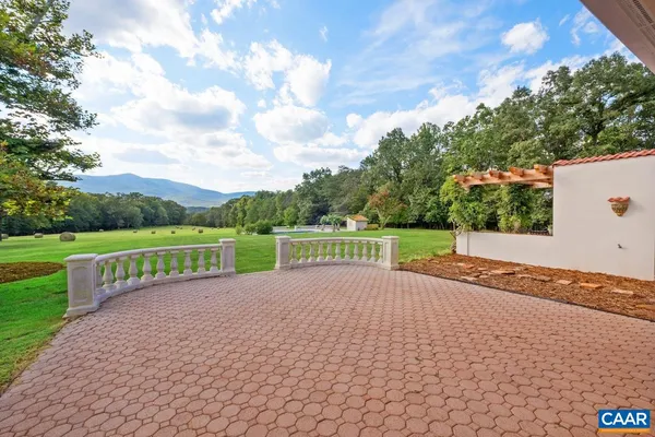 a table and chairs in front of a door