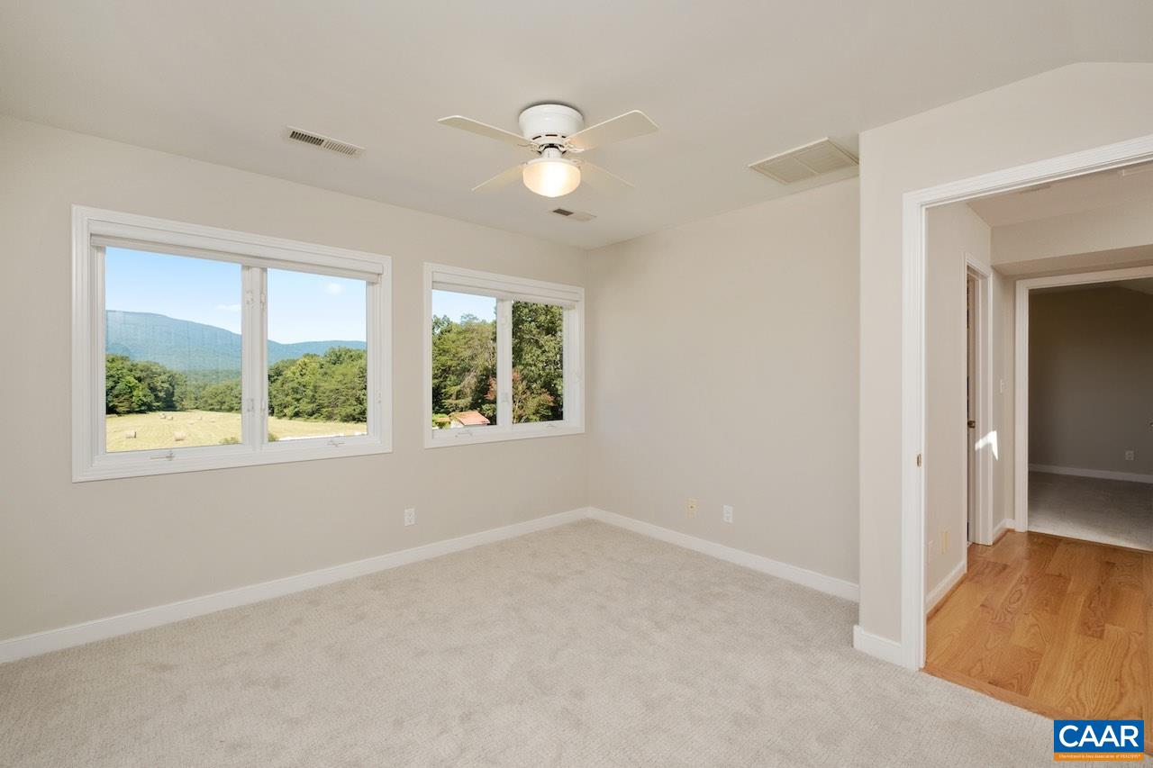 8540 Taylor Creek Road Afton, VA 22920 - Photo 53 of 71 wooden floor in an empty room with a window