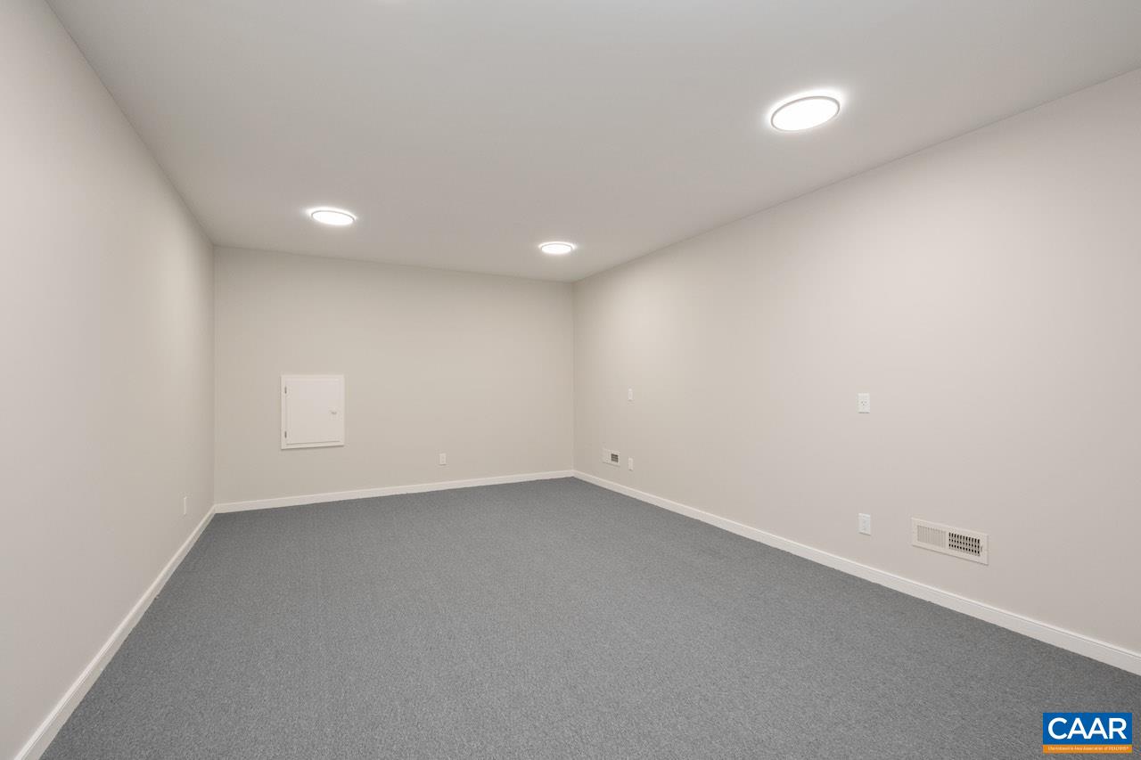 8540 Taylor Creek Road Afton, VA 22920 - Photo 57 of 71 an empty room with a empty space and window