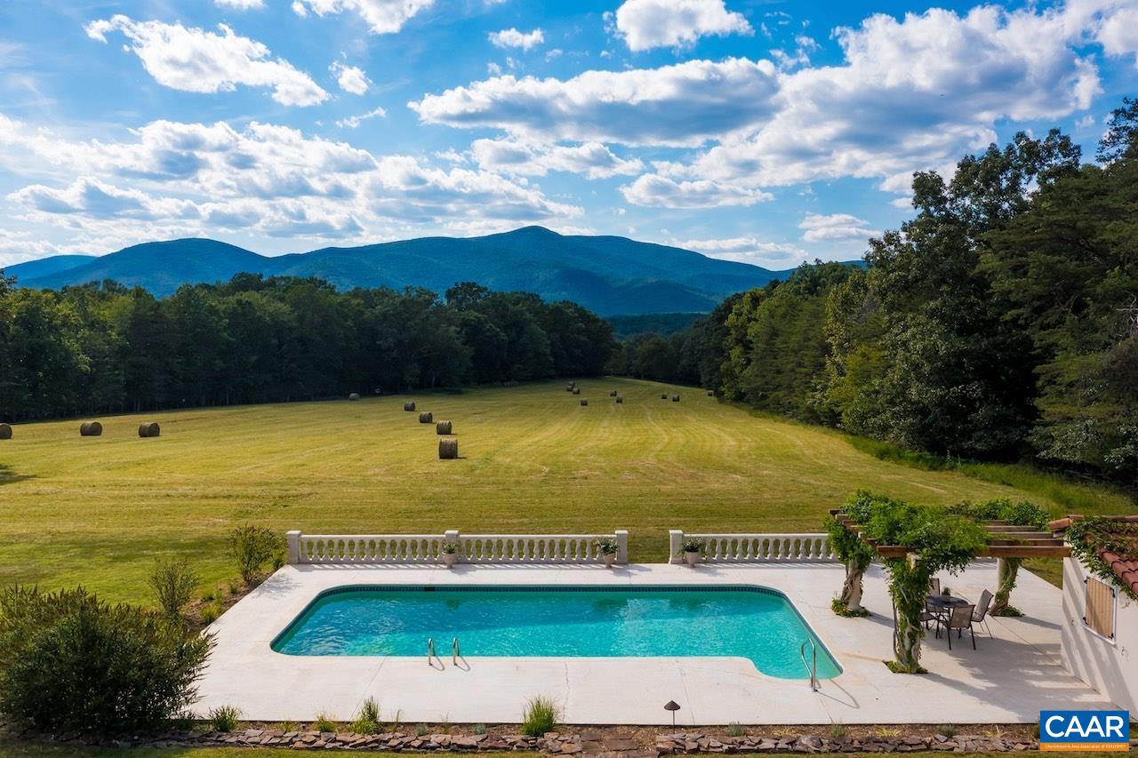 8540 Taylor Creek Road Afton, VA 22920 - Photo 67 of 71 a view of an swimming pool with seating area