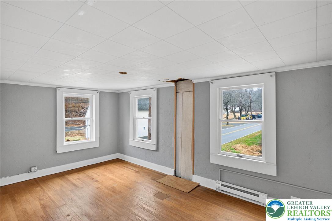 2205 Long Run Road Lehighton, PA 18235 - Photo 14 of 32 a view of an empty room with window and wooden floor