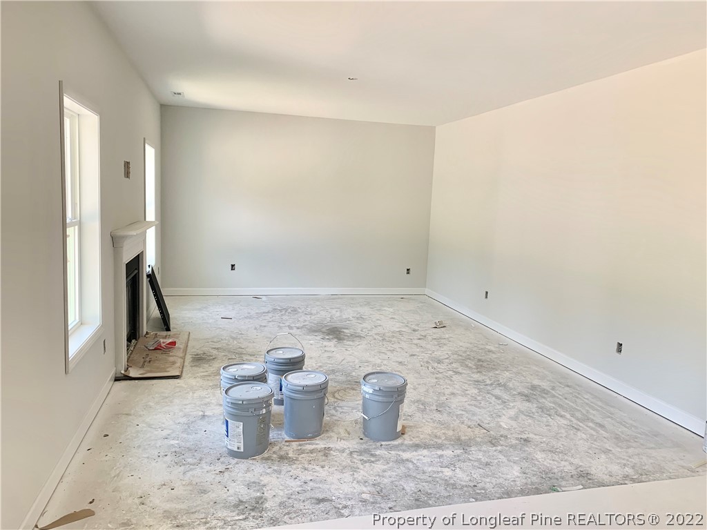 775 Montrose Road Raeford, NC 28376 - Photo 4 of 15 a view of a room with racks on the wall